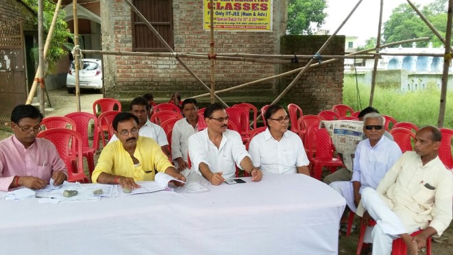 Dr Madhepuri and Vijay Verma outside polling booth