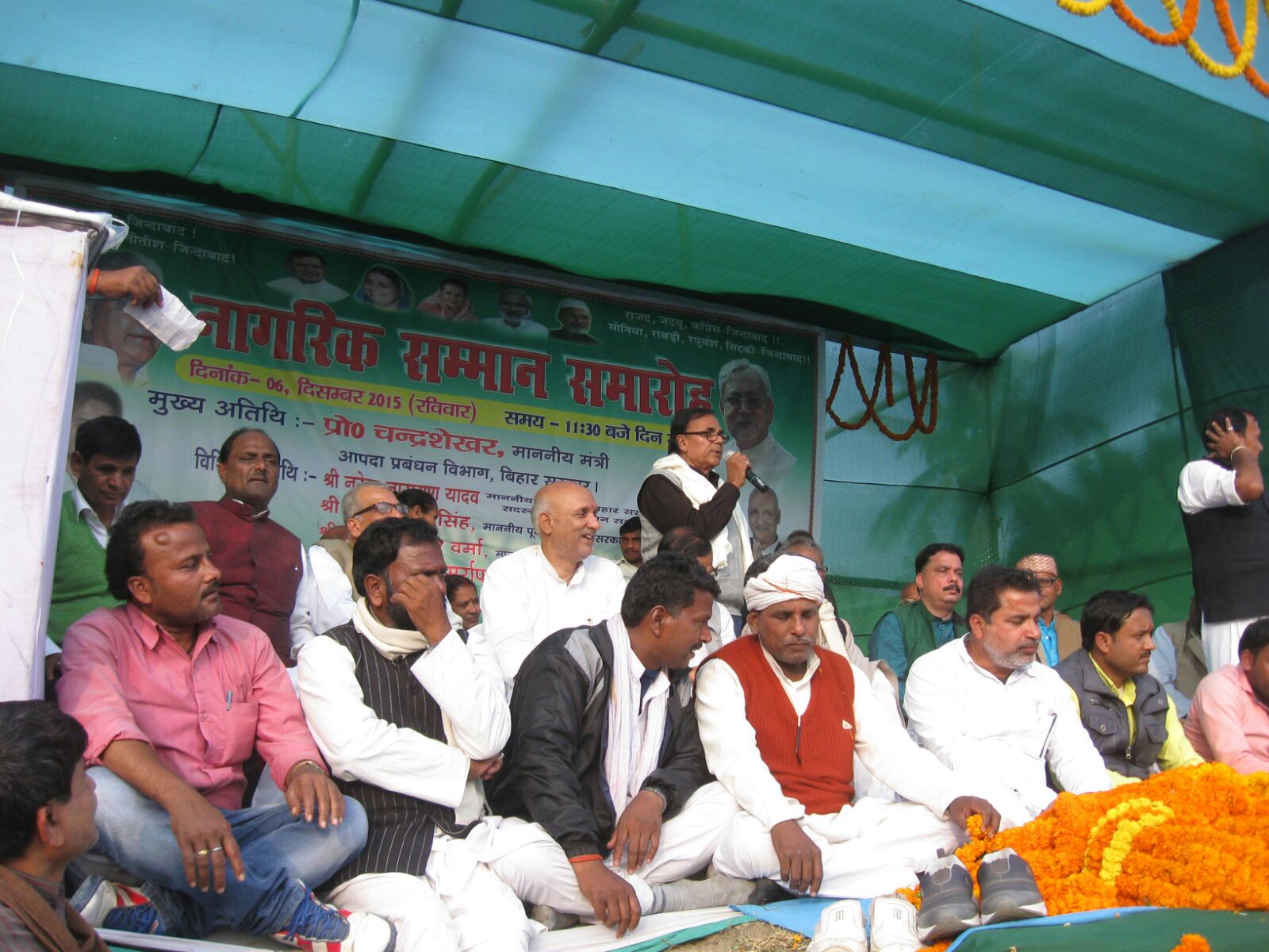 Dr.Bhupendra Madhepuri blessing the honourable minister Prof. Chandrashekhar.