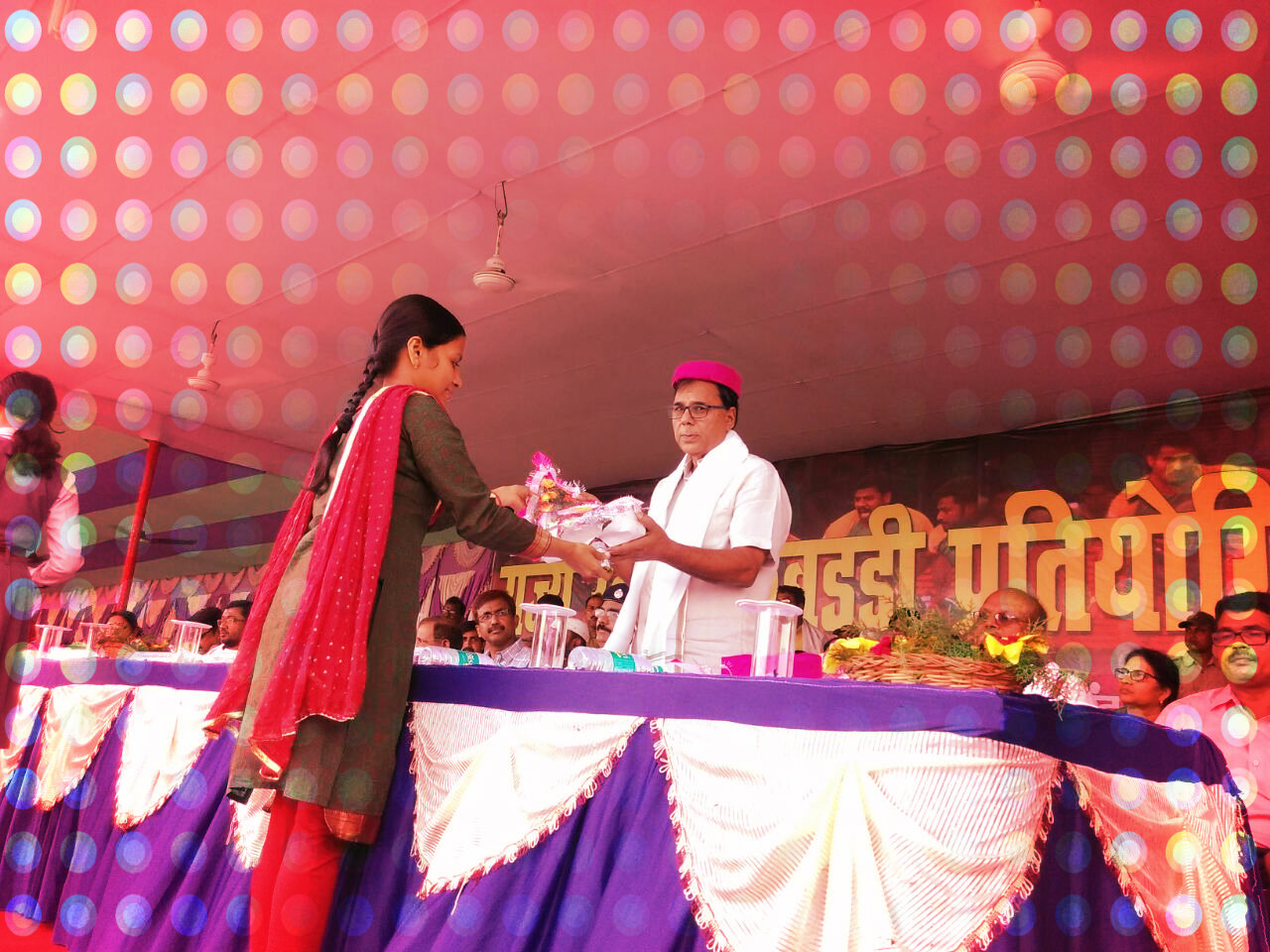 Dr.Madhepuri honoured by a popular C.D.P.O. of Madhepura District during State Kabaddi Competition at BN Mandal Stadium.