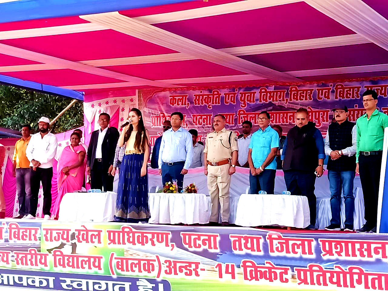 DM, SP, NDC, Dr.Madhepuri, LDM Ranjan Kumar Jha, Santosh Jha, Arun Kumar, Rekha Devi & others attending National Anthem with a baby singer Shivali.