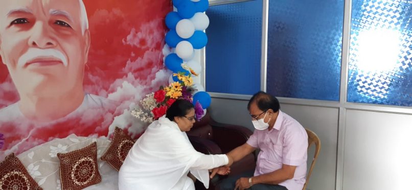 Brahmakumari Ranju Didi tieing Rakhi to Dr.B.N.Yadav Madhepuri on the occasion of Raksha Bandhan.