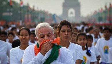 PM Narendra Modi performing yoga at Rajpath Delhi